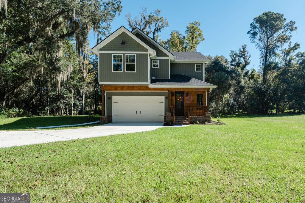 Photo of 91 Sir Edward Teach Road, Midway, GA 31320 (MLS # 10880127)