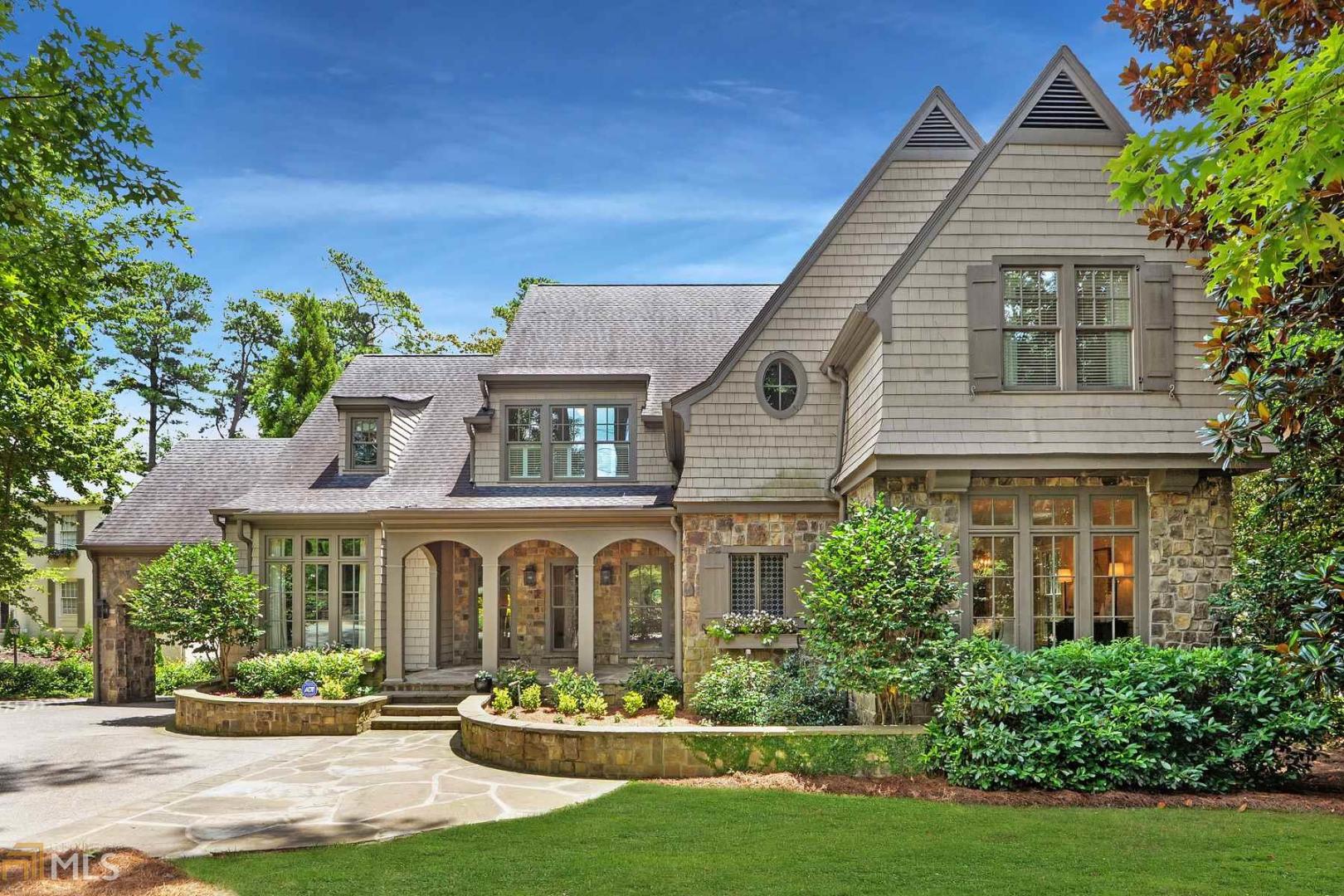 Stunning T.S. Adams designed home on almost one acre in the heart of Buckhead. The home features gorgeous finishes throughout including tongue and groove heart pine floors, chef's kitchen which opens to the bright family room and five fireplaces. One of the highlights of the home includes the year-round, four-season porch room with stone floors with separate heating and cooling. The large master suite includes his/her closets, steam shower and a private outdoor deck. There are five additional bedrooms in the home. Terrace level of the home is an entertainer's dream, complete with a bar/kitchen, wine cellar and workout space. The home also features two separate offices. The expansive flat, backyard has endless possibilities including the perfect location for a pool and pool house. The home is close proximity to all local public and private schools, shops and restaurants in the Buckhead area.