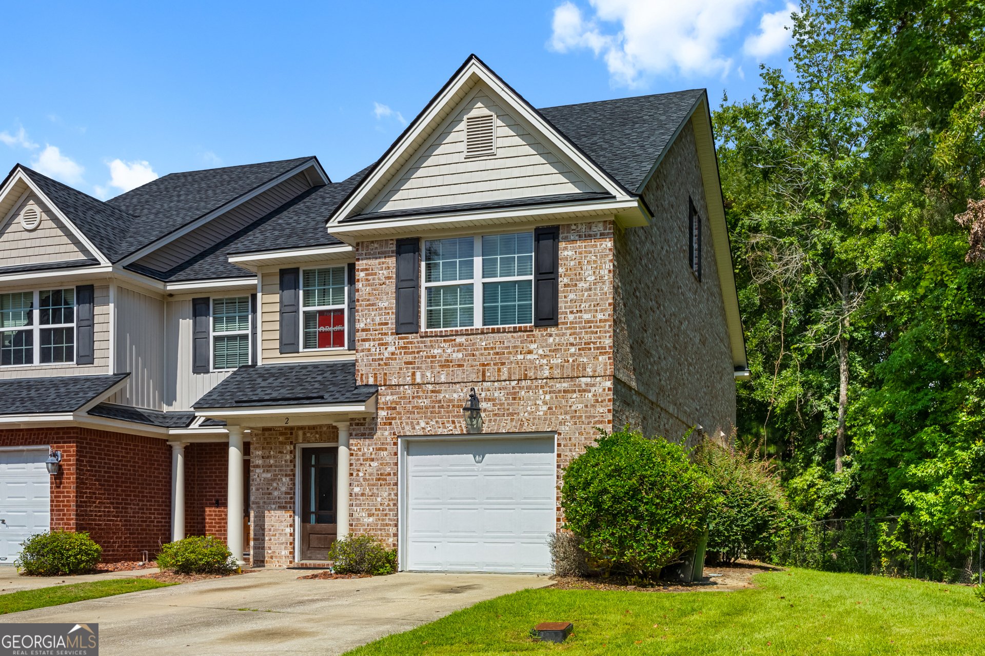 Discover your Savannah sanctuary in the gated community of Weslyn Park! This stunning, move-in ready end-unit is the epitome of a Lowcountry retreat. Step inside to an open floor plan where sunlight streams across gorgeous newer LVP flooring. The modern island-style kitchen shines with granite countertops and recently installed high-end appliances. Enjoy total peace of mind knowing the roof was just replaced! Unwind in the impressive owners suite, boasting soaring ceilings and a versatile private loft-perfect for a home office or reading nook. Experience secure, low-maintenance living at its finest, ideally located just moments from I-95 , shopping restaurants, and Hunter AAF. This sweet retreat wont last long!