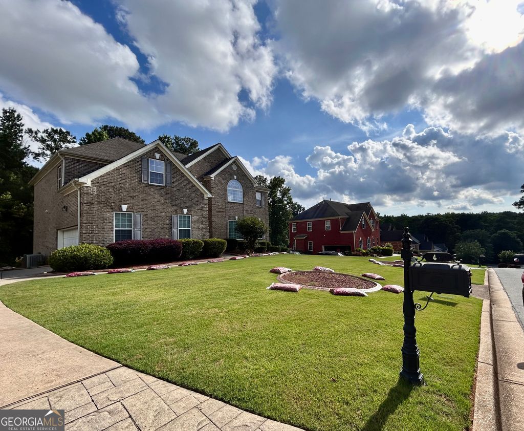 Photo of 2420 Brynlyn Woods Drive NE, Conyers, GA 30013 (MLS # 10782352)