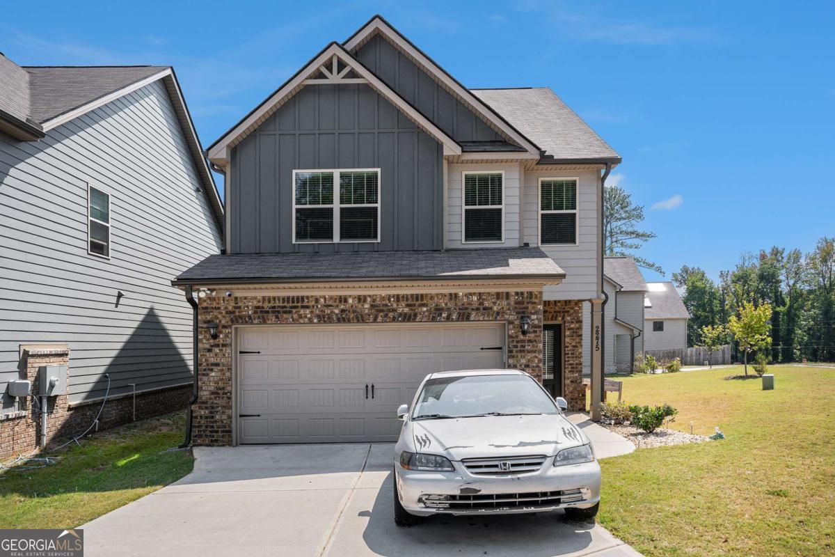 Welcome home! This meticulously maintained 4 bedroom, 2.5 bathroom home is nestled in the desirable Church Street Commons community of Hampton with NO HOA! The main level boasts 9-ft ceilings, a stunning brick fireplace, and sleek luxury vinyl plank (LVP) flooring, creating a warm and inviting atmosphere. The heart of the home features 42" cabinets, gleaming granite countertops, a stylish tile backsplash, and a spacious breakfast bar. It's equipped with stainless steel appliances, recessed lighting, and Venetian bronze fixtures, making it a chef's dream. Upstairs, the primary suite offers a tranquil retreat with a vaulted ceiling and spa-like bath featuring a double vanity, separate tub and shower. Three additional bedrooms and a full bath are down the hall. Situated at the end of the street, this property provides ample space for outdoor activities, gardening, and gatherings. Conveniently located near local shops, dining, and major highways, including I-75, commuting to nearby cities is a breeze. Don't miss the opportunity to own this exceptional property. Schedule your showing today!