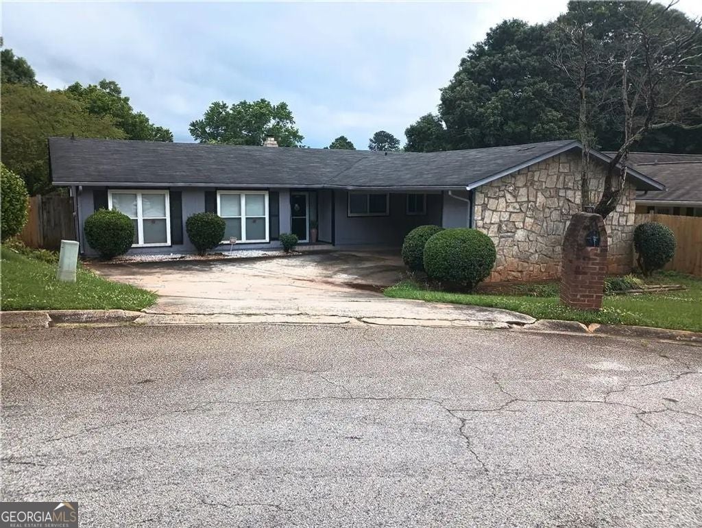 Photo of 4419 Carriage Trail, Stone Mountain, GA 30083 (MLS # 10850947)