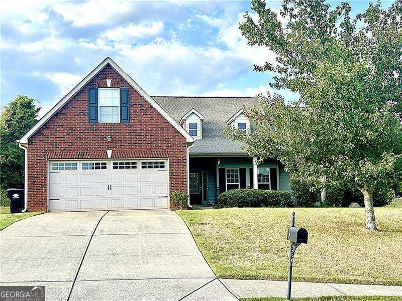 Adorable ranch home with lovely rocking chair front porch with a view located in great location and move in ready! This home offers an open floor plan and huge bonus room/4th bedroom upstairs. Home is located in sought after neighborhood located a short distance from downtown Cartersville. Check out the beautiful LVP wood floors throughout the main level. The split bedroom plan offers an oversized owner's suite with sitting area or office space and tray ceilings. Owner's bathroom has double vanities, seperate soaking tub and shower and large walk-in closet. Secondary bedrooms are very spacious with vaulted ceilings. Large family room has tons of natural light, vaulted ceilings, fireplace and view to the kitchen. The beautiful kitchen has stainless steel appliances, large breakfast bar, tons of cabinet and counter space, breakfast area and pantry. Don't miss the bonus room upstairs, perfect for a teenager or home office or media room. Bonus room has it's own mini-split heat and air system. The over sized, private yard allows for outdoor living and entertaining with the privacy fence, deck, patio and swingset. Roof and water heater are less than 5 years old.