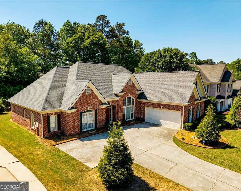 Photo of 1129 Pughes Creek Way, Lawrenceville, GA 30045 (MLS # 10735897)