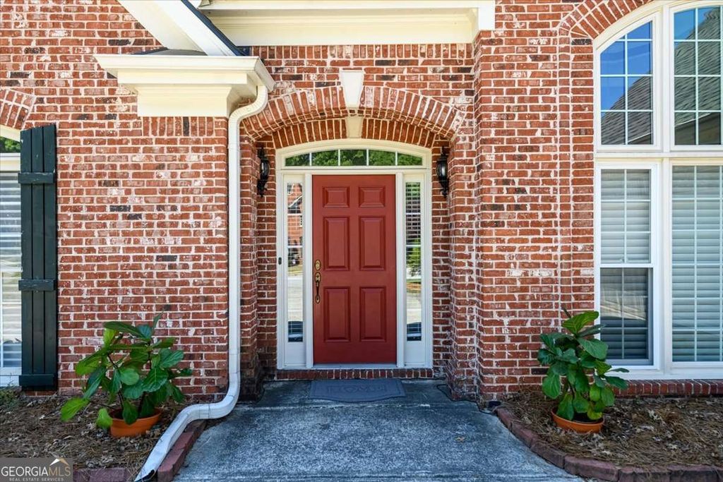 Photo of 1129 Pughes Creek Way, Lawrenceville, GA 30045 (MLS # 10735897)