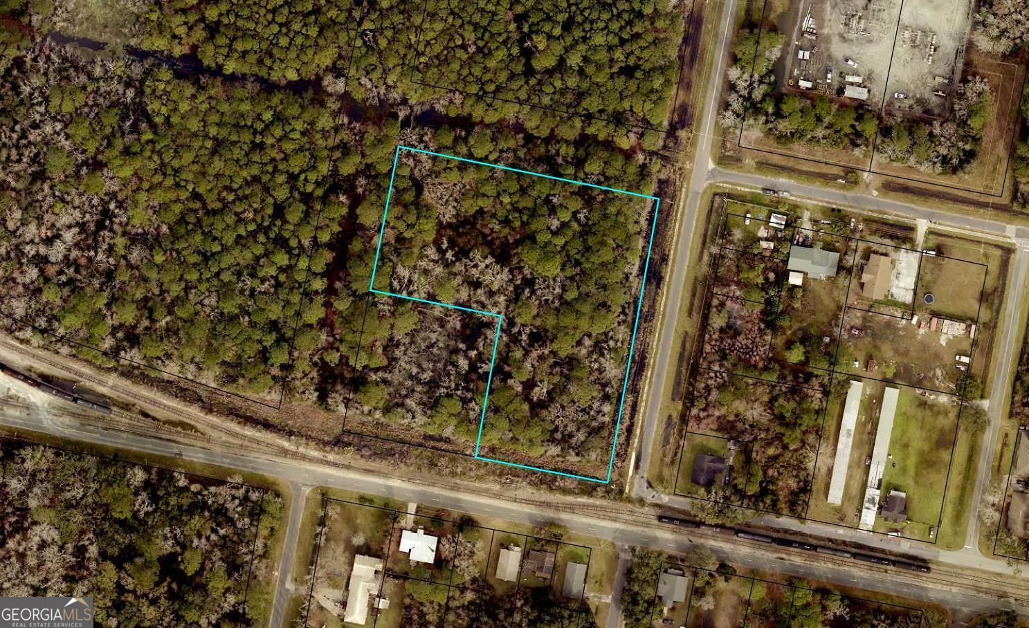 Prime & rare 2.95-Acre Lot in St. Marys, GA - Minutes from Downtown! Don't miss this rare opportunity to own nearly 3 acres of wooded privacy in charming St. Marys! Located at 301 St. Patrick St., this spacious and secluded parcel offers the perfect blend of natural beauty and convenience. Just minutes from historic downtown St. Marys and a short drive to Jacksonville, this property provides the ideal setting to build your dream home with room to spare. With generous acreage, there's ample space for a private estate, outdoor amenities, or even the potential to subdivide and develop. Surrounded by nature, yet close to schools, shopping, and the waterfront, this lot offers both tranquility and accessibility. Zoned residential and ready for your vision-whether you're planning to build your forever home or invest in a development opportunity, this property is a must-see!