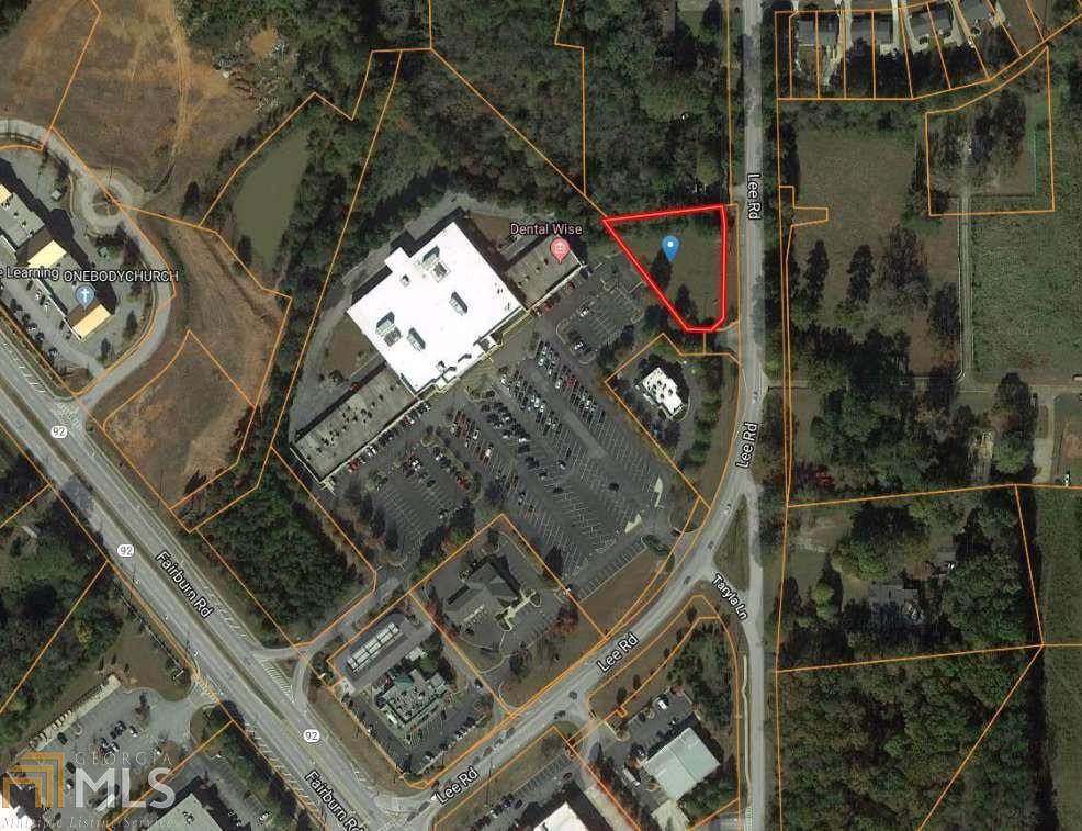 0.6 acre Level Lot adjacent to Neighborhood shopping including Publix, Walgreens, Wells Fargo and more. Ready to build with curb cut in place. Just off Fairburn Road/ Hwy. 92 in a busy area of Lithia Springs. Zoned C-G.