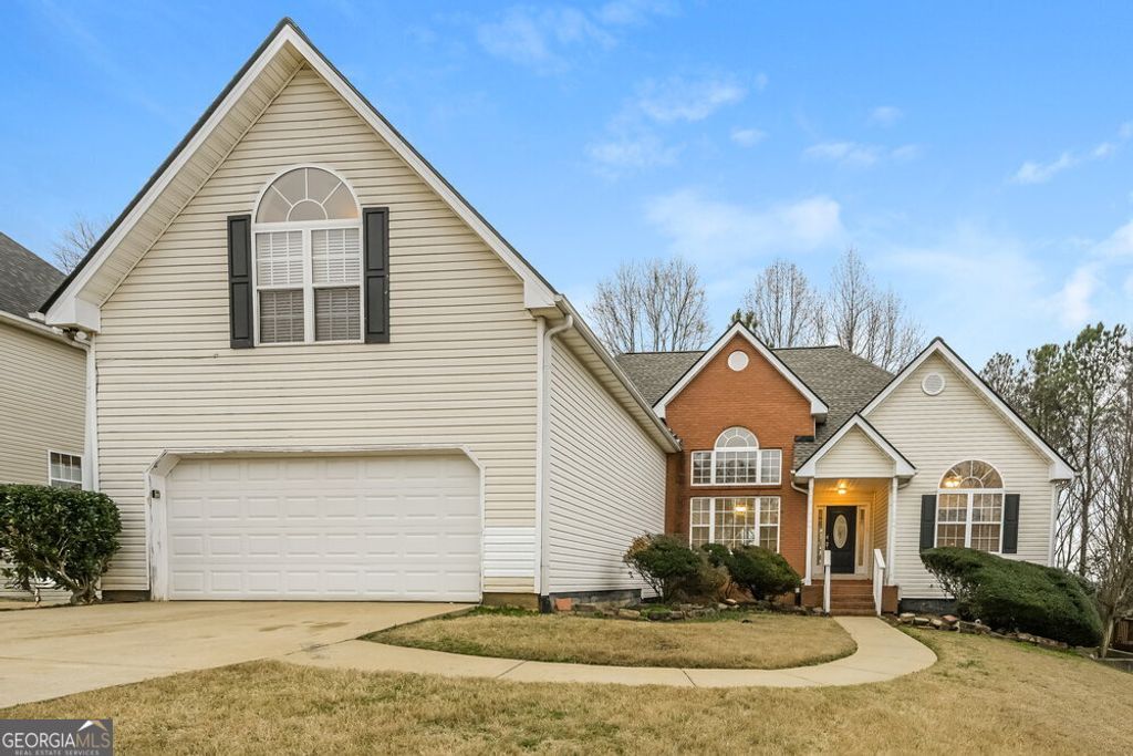 Photo of 875 Georgian Hills Drive, Lawrenceville, GA 30045 (MLS # 10680384)