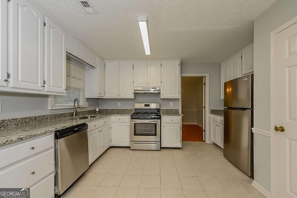 Photo of 141 Mcelroy Road, Fayetteville, GA 30214 (MLS # 10871539)