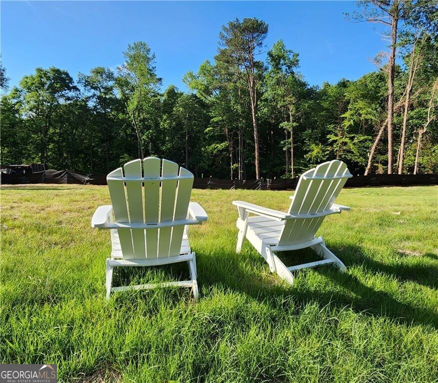 Prestigious Buckhead Land Opportunity Near Chastain Park Your Dream Estate Begins Here - Builder Plans & Site Work Included Welcome to one of the last rare, buildable parcels in Buckhead's most coveted enclave in the CHASTAIN PARK neighborhood -5 min from Chastain Park, where luxury living meets unmatched convenience. This just-shy-of-an-acre homesite is nestled among Atlanta's finest multimillion-dollar estates, offering a canvas for your custom dream home. This opportunity is more than just land-it's a head start. A full site evaluation has already been completed, and architectural plans by the esteemed Stokesman Luxury Homes are ready to go. Should you choose to work with them, every detail-from design to build-can be streamlined with elegance and precision. This location satisfies every need within minutes. Whether it's top-tier dining, elite private schools, upscale retail, golf, or a serene morning stroll through Chastain Park-you're at the epicenter of Atlanta's best. Highlights: * Prime Buckhead address surrounded by luxury estates * Walkable to Chastain Park and all the recreation it offers * Site plans and architectural designs convey with sale * Builder relationship in place with Stokesman Luxury Homes * All site prep work done-saving time, money, and guesswork * Nearly 1 acre of build-ready land This is more than an address-it's a legacy in the making. There is an Architectural plan design for a new construction home of approximately 8,000sqft on a basement. Preliminary site plan available upon request. Images in listing are SAMPLE IMAGES ONLY OF BUILDER PRODUCT
