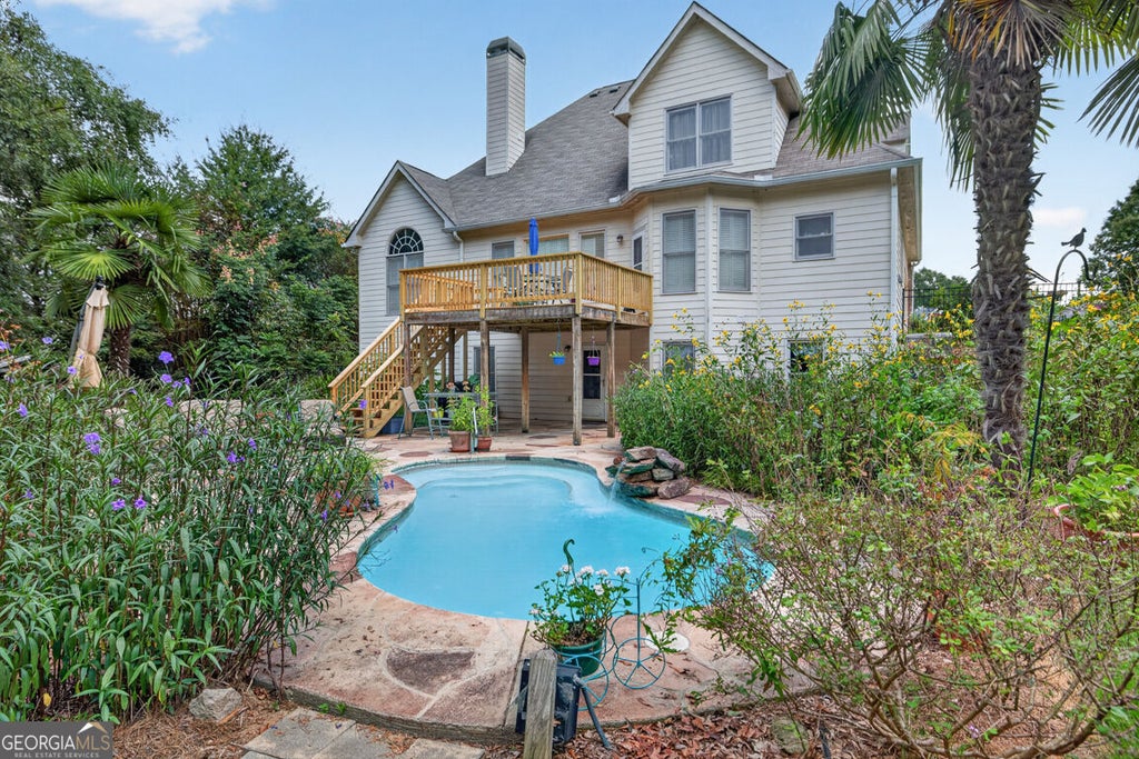 Photo of 2194 NE Indian Shoals Drive NE, Loganville, GA 30052 (MLS # 10836025)