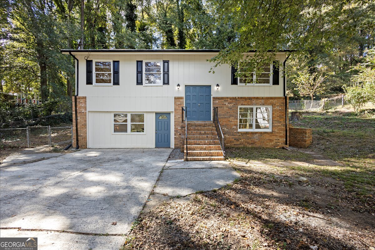 Spacious 6-bedroom, 2-bath home in the heart of Norcross with no HOA! This updated property features hardwood and LVP flooring throughout, a finished lower level offering additional bedrooms and flexible living space, and all appliances included. Enjoy convenient access to I-85, downtown Norcross, shopping, dining, and schools. A great opportunity to own a large, move-in-ready home in an established community without HOA restrictions.