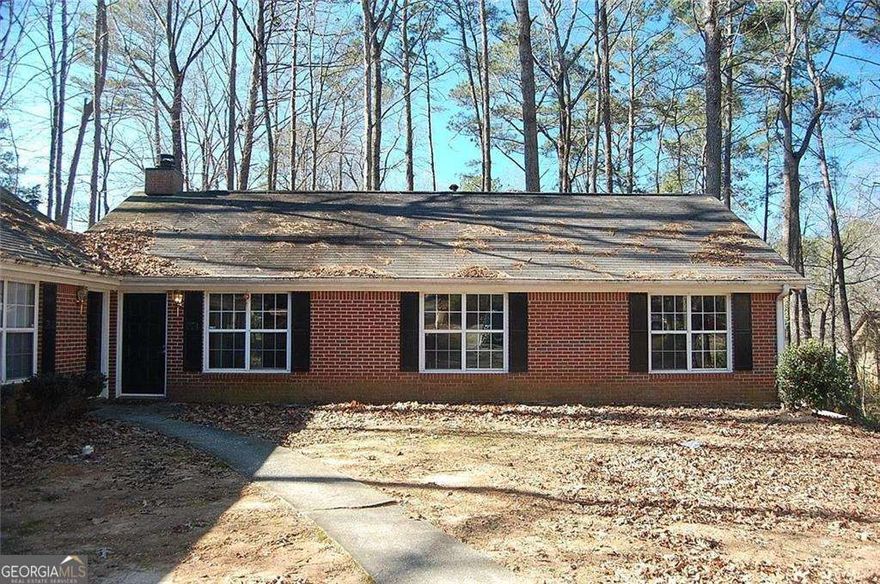 This three bedroom two full bath ranch style brick home is a rare find this close to downtown Woodstock with easy access to I-575. A generous kitchen with all white appliances and a breakfast nook, laundry room and sliding door to the patio. Large unfenced backyard with a storage building included.