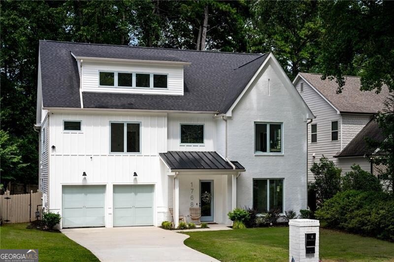 Built in 2023, this nearly new construction light-filled home offers a perfect balance of high-end finishes and functional design. The open floor plan features a gourmet kitchen with top-tier appliances, custom cabinetry, and a spacious scullery. A formal dining room with wet bar and a fireside family room open to a large, covered patio overlooking the private, fenced, irrigated backyard. A mudroom off the 2-car garage and a main-level bedroom with full bath add convenience. Upstairs, the primary suite boasts a private covered patio, two walk-in closets with built-ins, dual floating vanities, LED backlit mirrors, soaking tub with waterfall faucet, and a large shower. Three additional bedrooms and a laundry room complete the second floor. The third level features a flexible bonus room perfect for an office, gym, or playroom plus another ensuite bedroom. Ideally located near Brookhaven with easy access to Buckhead and major highways, top schools, parks, and the vibrant shops and restaurants of Dresden Avenue.