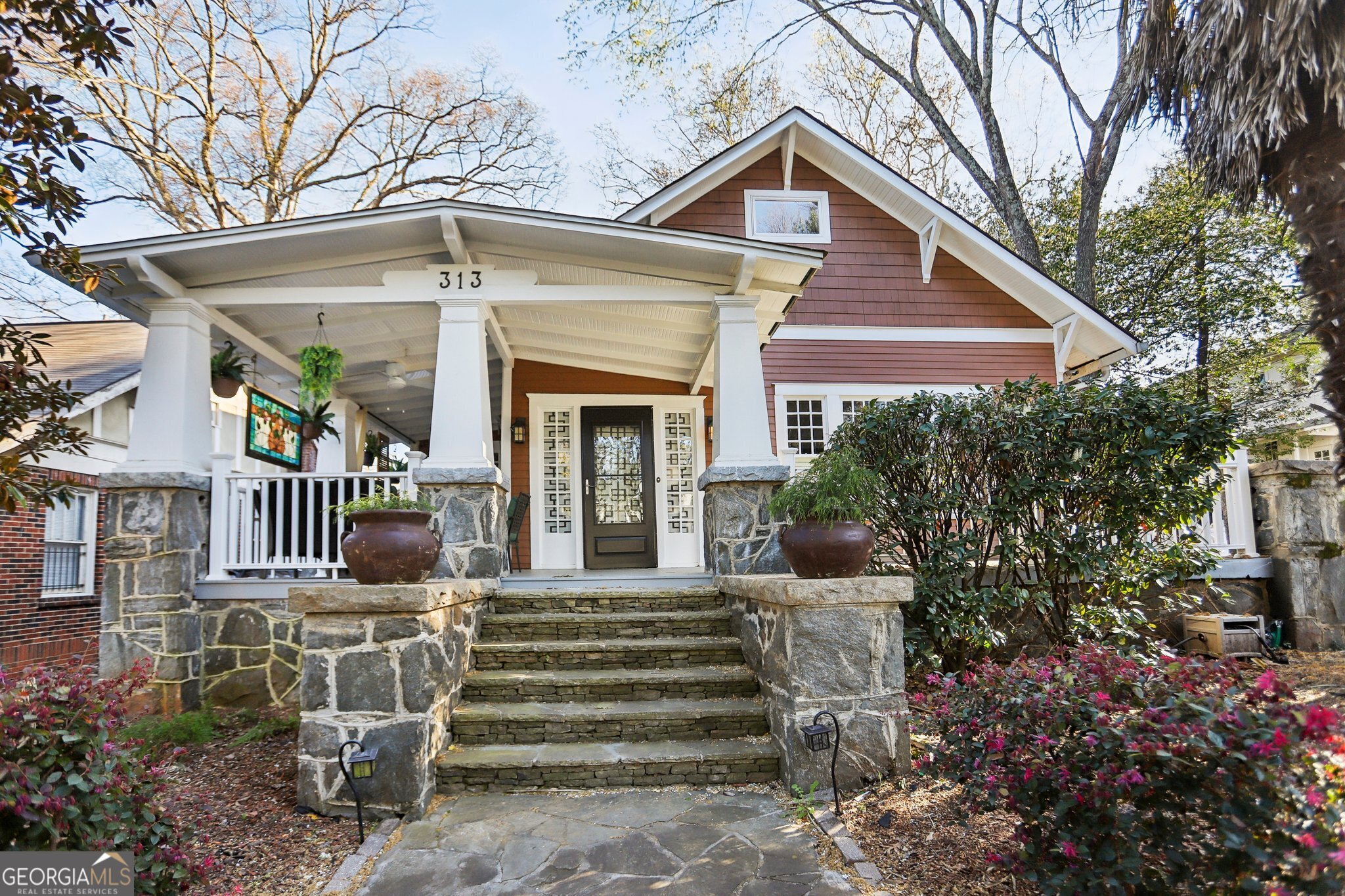 Charming Intown Bungalow with Guest Cottage - Classic Comfort Meets Modern Convenience! Welcome to this beautifully renovated Midtown bungalow, where timeless character blends effortlessly with thoughtful updates and versatile living spaces. This inviting home offers a rare chance to enjoy city living at its best-with the added bonus of a fully equipped guest cottage perfect for extended family, visitors, or a private home office. Step onto the gracious covered front porch and into a light-filled main home featuring high ceilings, gleaming hardwood floors on both levels, and spacious rooms throughout. The warm and welcoming living room is centered around a cozy fireplace and framed by elegant coffered ceilings and six oversized windows, bathing the space in natural light. A formal dining room, also with coffered ceilings, offers the perfect setting for dinners with friends or holiday gatherings. The kitchen is a true highlight-designed with the home chef in mind, featuring ample counter space, a walk-in pantry, and a bright breakfast nook for everyday dining. Every bathroom has been tastefully updated, offering modern comfort with timeless appeal. Upstairs, the large primary suite is a true retreat, with a sitting area, oversized closet, and a spa-like bath with a skylight. A flexible den/media room could easily serve as a fourth bedroom, nursery, or home gym. The separate guest cottage offers a full kitchen, bedroom, and bathroom-ideal as a private space for visitors, a long-term in-law suite, or even a creative studio. The private backyard feels like an oasis in the heart of the city, complete with a deck, patio, and hot tub-perfect for relaxing or entertaining. Additional features include a basement for storage, and off-street parking for 2-3 cars. All this just blocks from Piedmont Park, the BeltLine, and the vibrant shops, dining, and entertainment of Midtown. Whether you're putting down roots or looking for a flexible living arrangement, this rare gem combines classic charm, modern updates, and unbeatable location in one perfect package. Come see it today and fall in love! The property is currently used as a short-term rental, with revenue spreadsheets available upon request for those interested in exploring its full potential.