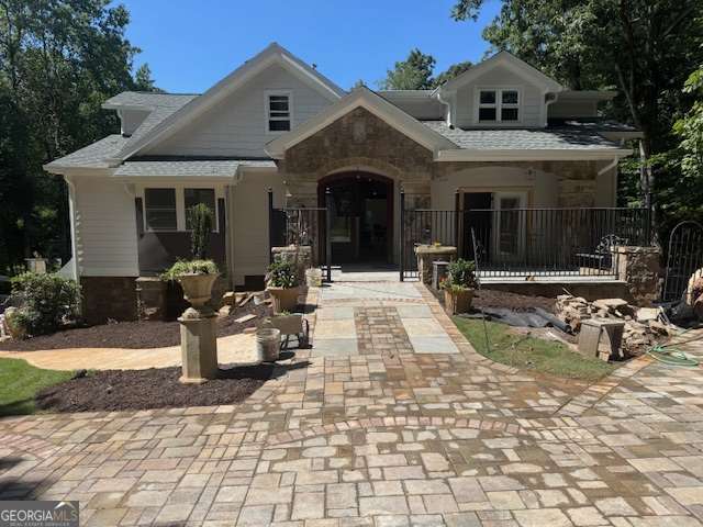 Discover unmatched craftsmanship and thoughtful design in this brand-new 7 bedroom 7 bathroom luxury home on a finished terrace level apartment, perfectly situated on a lush wooded home setting at the end of a peaceful street. This mountain like retreat in the city, with walking distance to Walton High School and zoned for TOP-RATED SCHOOLS is built by a retired builder with a lifetime of experience, where every inch of this property showcases quality and detail rarely found in today's market. In addition to the 4 car garage, basement has large doors for easy access, and a circular driveway around the entire house provides even more convenience. Craftsman stonework compliments the courtyard and covered front porch, setting the tone for the elegance inside. Step through the foyer into an open and airy floor plan designed for modern living with a traditional feel offering breathtaking views from every room. The great room features a grand fireplace, and a large projection-ready wall for game days or gatherings. The open-concept dining area flows seamlessly into the show-stopping two story kitchen surrounded by a 360 degree balcony. Large island, granite countertops, bright tastefully color coordinated cabinetry including, glass display cabinets for an even more elevated feel, and high-end stainless steel appliances of your choice. You will be pleasantly surprised by the design elements in this space! Your eye is easily drawn from every room on the main level to the large covered porch and lake view. Your relaxation on this porch is enhanced by the exposed beamed ceiling and the craftsmanship detailed fireplace. The beautiful views continue in the MAIN-LEVEL PRIMARY SUITE featuring a sitting area, double vanity, freestanding soaking tub, dual shower heads, and an optional custom wardrobe. Two additional rooms on the main level offer flexibility-one currently serves as a library with a fireplace and private bath. Whereas the other room opens to the sprawling porch. Upstairs, you'll find two en-suites and adjacent loft area. The FULL FINISHED TERRACE level expands your living space with a complete full apartment with its own private entrance and garage. Sports enthusiasts, we had you in mind! Whether it's a game on your pickleball court, working on your chipping and putting, or enjoying billiards, there are so many ways to kick back and enjoy life. Additional features include a sound system, high efficiency Lennox HVAC, and an irrigation system ready to extend to a garden. The spacious backyard is ready to be fenced for your furry friends with both foot and vehicular bridge. There's even space for your dream pool or water feature. This is more than a home-crafted with meticulous attention to detail and offering endless possibilities for customization. With a neutral color pallet, take advantage of the builder's expertise to tailor every feature to your style and bring your vision to life!! Conveniently located near major highways for a smooth commute, healthcare, and all the shopping, dining, and year around entertainment you can imagine.