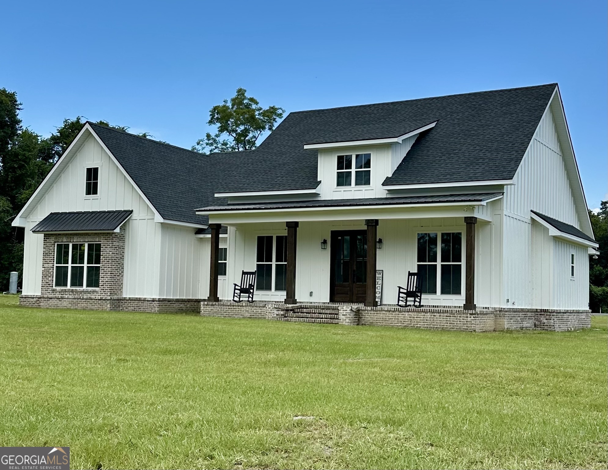 Connected to Lakeview Golf Club! **Modern Country Home for Sale - Home Features: 4 Beds 3 Baths 2580 SQFT - heated and approx 4500 total SQFT. Current appraisal is at $490,000. It's 1.6 Acres of Land** If you're Looking for the perfect balance of modern comfort and country charm? This stunning 4-bedroom, 3-bath home is setting on two lots that equals 1.6 acres. It's just down the road from Beautiful Lakeview Golf Club. Imagine driving your golf cart directly to the course from your front door! With a sleek, contemporary design blended with country-style accents. Enjoy ample outdoor space, perfect for relaxation or entertaining. The builder didn't spare a dime from the Brick around the home to the vertical Hardy Board, High end custom flooring and beautiful tile showers throughout All three bathrooms. ~This home is located in Golfview Estates giving you an amazing neighborhood Access to the golf club (golf cart friendly!) Don't miss out on this opportunity to own a gorgeous home in a serene yet accessible location. Put a contract in today!! Contact your favorite Agent today! **Seller is a Licensed Georgia Real Estate Agent/Broker.**