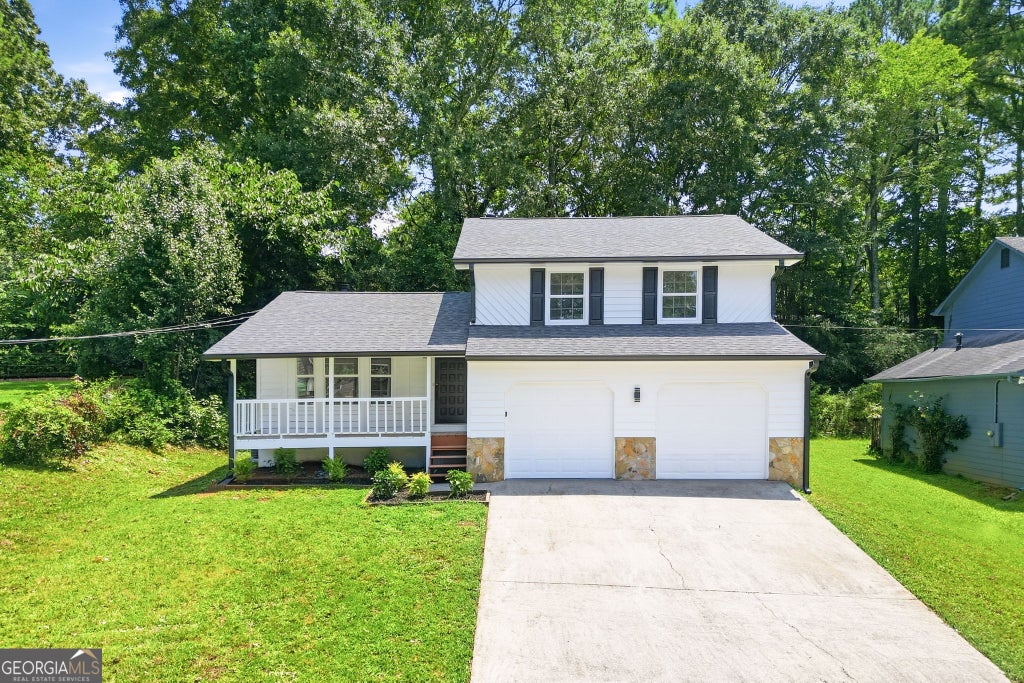 Photo of 5641 Clifton Place, Stone Mountain, GA 30087 (MLS # 10817432)