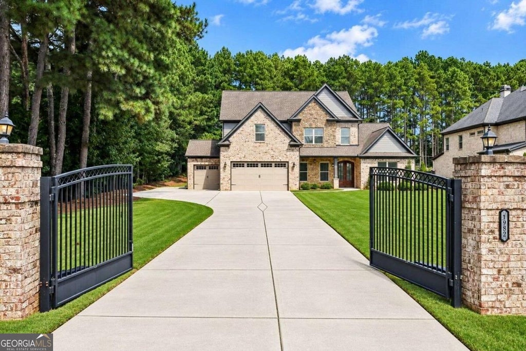 Photo of 1982 Old Peachtree Road NE, Lawrenceville, GA 30043 (MLS # 10842124)