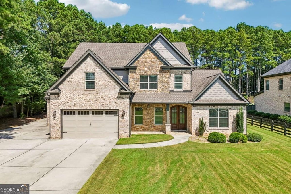 Photo of 1982 Old Peachtree Road NE, Lawrenceville, GA 30043 (MLS # 10842124)
