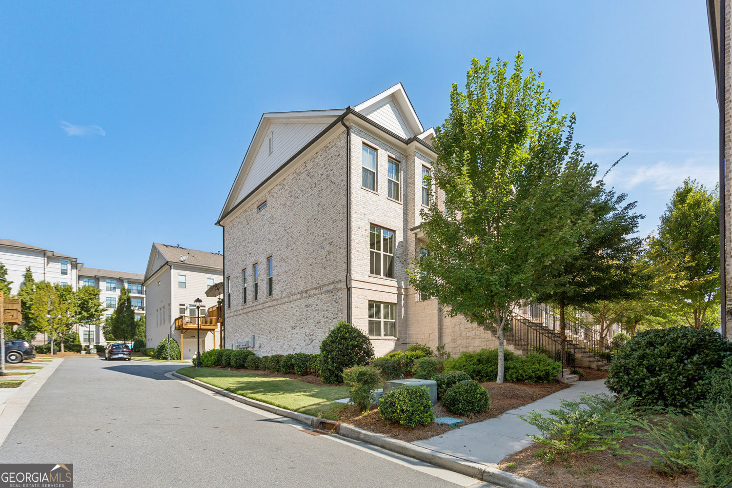 Nestled in the interior of the community, this *end-unit* townhome offers the perfect balance of convenience and tranquility. Located just steps from the community pool and neighborhood grill, you'll enjoy easy access to recreational amenities, yet its position offers the privacy and quiet you desire. The large, mature tree in front provides natural privacy for both the expansive kitchen picture window and the upper-level front bedroom, creating a serene atmosphere both inside and out. With no neighboring decks, driveways, or busy roads in sight, this home provides the peace and privacy you deserve. As an end-unit, this townhome is flooded with natural light thanks to extra windows that most other units don't enjoy. The abundant sunlight and open feel elevate the living spaces and make it a bright, welcoming place to call home. The Sellers have thoughtfully upgraded this home with premium health-conscious features. A new Aquasana Whole House Rhino System has been expertly installed to reduce chemicals, bacteria, viruses, and other common contaminants found in well water. With this award-winning water filtration technology, you can rest assured your water is safe and clean. The Air Scrubber by ActivePure further elevates the home's quality of living by continuously cleaning the air and surfaces. ActivePure technology has been scientifically proven to neutralize a broad spectrum of pathogens, including bacteria, viruses, mold, and fungi - giving you peace of mind that your indoor environment is always fresh and healthy. Come see why this townhome, with its ideal location, light-filled spaces, and added health features, stands out as a truly exceptional place to live.