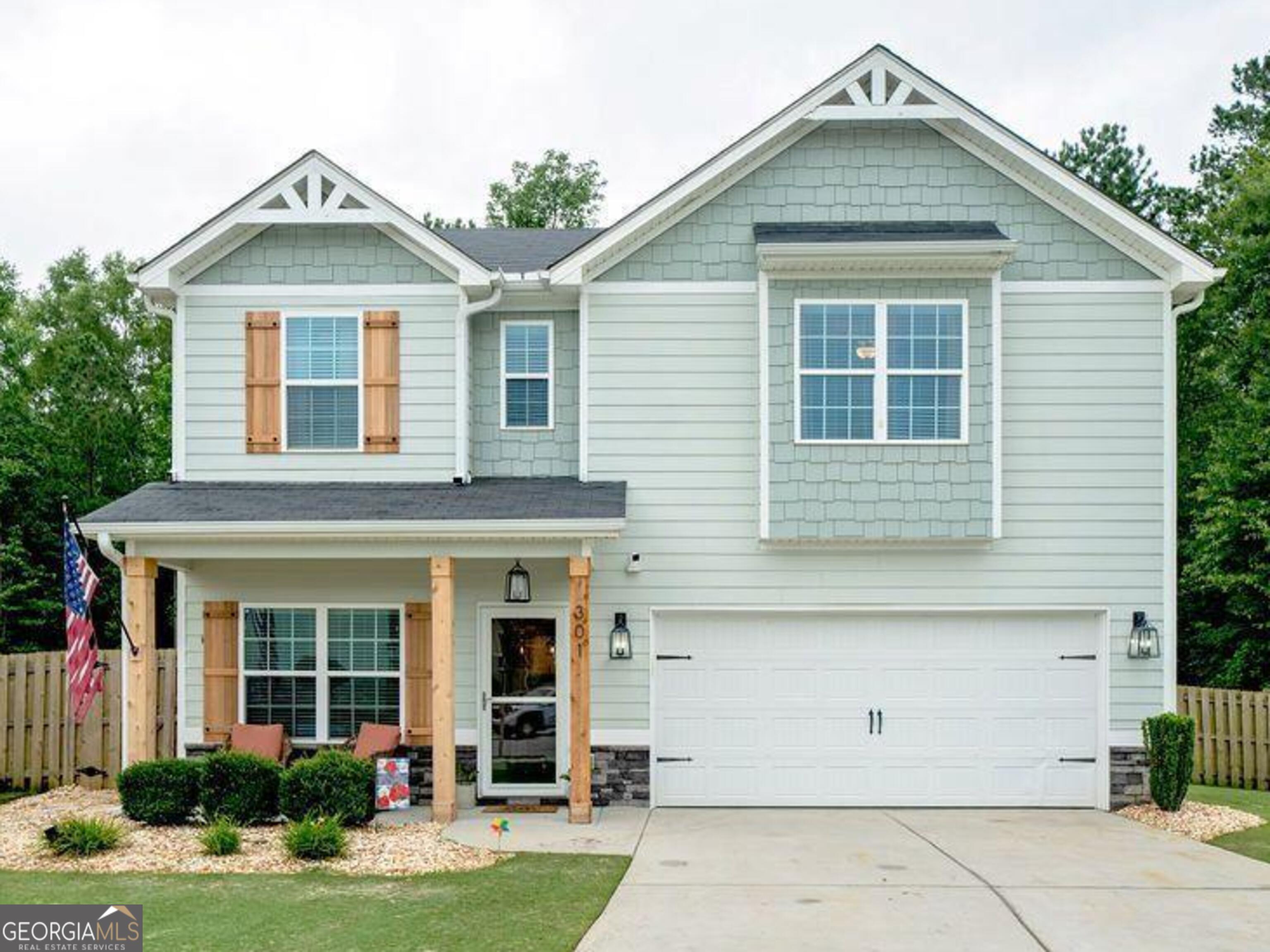 Wait until you see the upgrades that just happened!! Beautifully updated home with style ad functionality. Move-in ready and perfect for your family! Enjoy a fully fenced backyard retreat complete with a brand-new dedicated dog run - ideal for your furry friends! Inside you'll love the unique accent features that add character throughout the home. Fresh interior paint gives a modern touch, while LPV hardwood floors grace the first floor, stairs and upstairs loft area, blending beauty with practicality. All bedrooms are thoughtfully located upstairs, new carpets in the bedrooms - all creating a peaceful and private retreat for the whole family. Schedule that appointment today before it's gone! Nestled in a fantastic neighborhood and just minutes from top-rated schools, this home offers both convenience and charm. Don't miss this must-see opportunity.