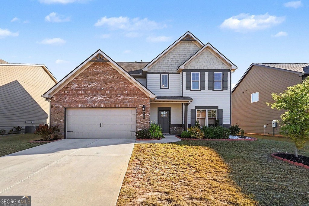 Photo of 305 Eleanora Crossing, Loganville, GA 30052 (MLS # 10879439)