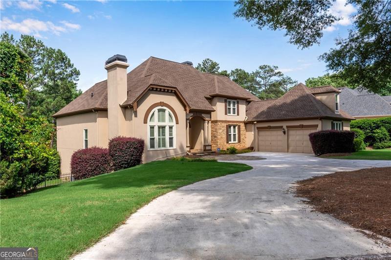 Photo of 1006 Quaker Ridge Way, Johns Creek, GA 30097 (MLS # 10810234)