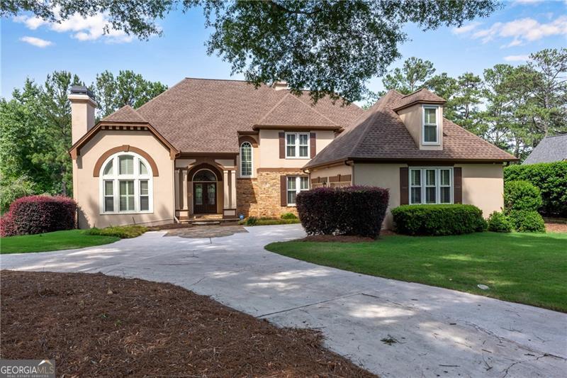Photo of 1006 Quaker Ridge Way, Johns Creek, GA 30097 (MLS # 10810234)