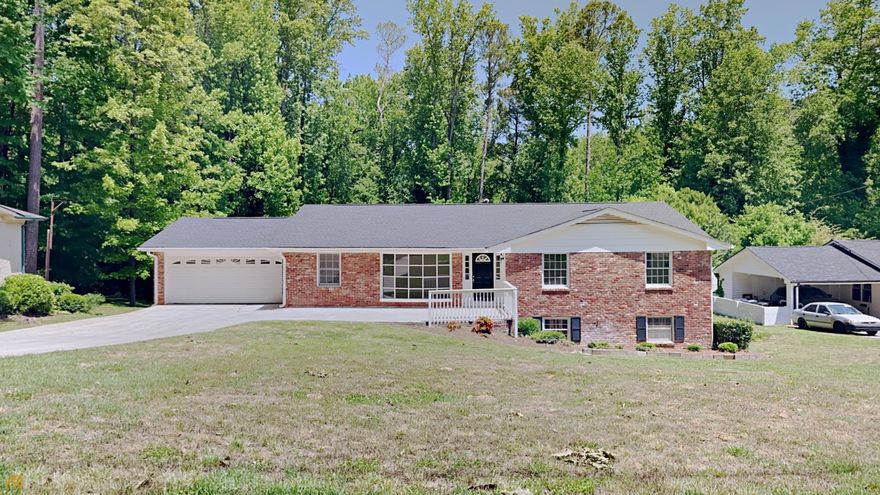 This a newly renovated 2 car garage 4 bedrooms 2 bathrooms brick ranch with a deck on a large lot sitting on an unfinished basement. The home has a new hvac unit and new paint. The primary suite is a jack and Jill combo. The kitchen has quartz countertops and a new stainless steel dishwasher and cooktop. This home has a long driveway for plenty of parking for your guests and the spacious unfinished walkout basement provides space for storage. This one won't last long, so come check it out and place your offer !