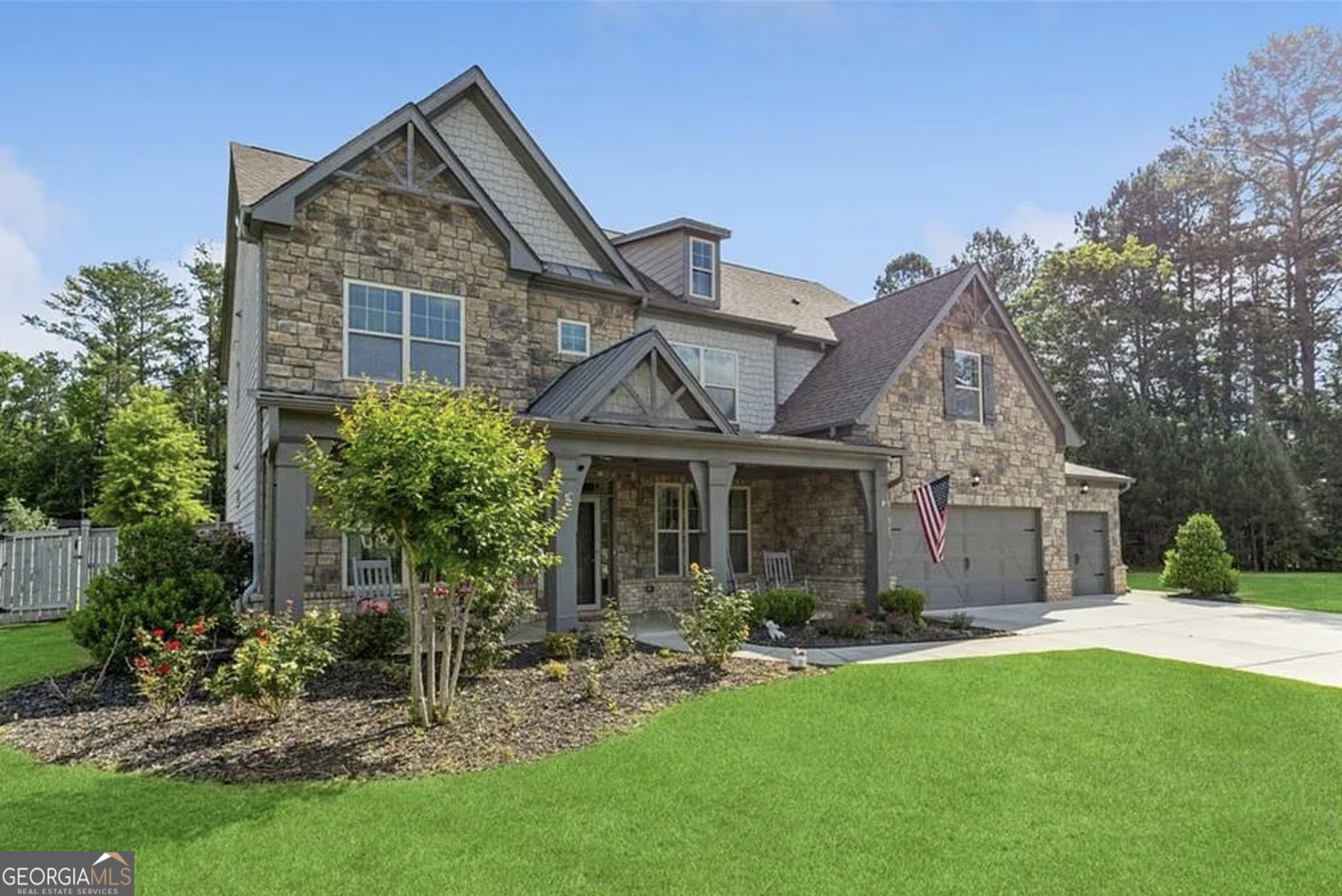 You must see this beautiful 2017 executive home in the exclusive west Cobb community on a cul-de-sac with a resort-style saltwater pool! The spacious 3,910 sq ft 5 bed / 4 full bath home is in HIGHLY sought after and nationally ranked Harrison High School District! This home is perfect for a large or growing family. Sitting on expansive .466 acres and the best premium lot in the neighborhood, it boasts a 3-car garage and level fenced backyard. Pristine hardwood flooring throughout ENTIRE home. On the main level you'll find a grand 2-story foyer, a formal dining room with coffered ceiling, large main level office with French doors, and a convenient guest/in-law bedroom suite. You will love the open concept family room with extra-large and plentiful windows providing tons of natural light! The exquisite chef's kitchen features granite countertops, soft close cabinets (also throughout home), double oven, subway tiled backsplash, oversized Island, gas cooktop, and upgraded appliances. Upstairs features 4 additional spacious bedrooms including an oversized primary suite with trey ceiling, his & hers granite sink, tiled shower, garden tub and huge walk-in closet. Also, upstairs - a huge loft bonus room, currently a Pilates studio! Also upstairs are two full bathrooms and a laundry room. The backyard is an entertainer's dream featuring a saltwater swimming pool with waterfall, game day covered living space with fireplace & TV. This safe west Cobb neighborhood is close to downtown Acworth and Lake Allatoona, as well as schools, shopping, and upscale west Cobb dining. It's hard to find a 5-bedroom custom home that was built in 2017 or newer in the Harrison district. Sellers are providing an active termite bond and home warranty. Come see this gorgeous pool home now before it's gone!