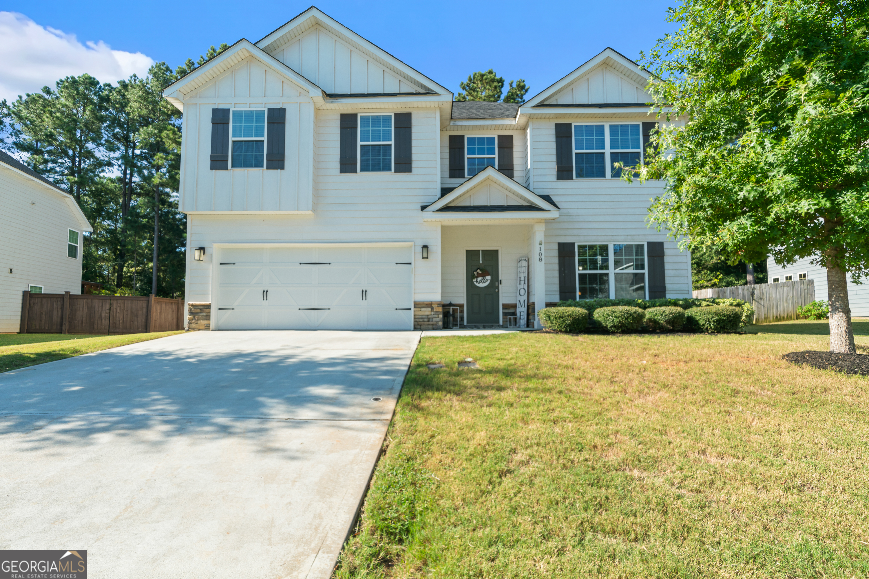 Discover comfortable and stylish living at 108 E River Cane Run! This stunning 2020-built home offers a spacious layout with 5 bedrooms and 3 full bathrooms, perfect for families or those needing extra space. Step inside to an open-concept design featuring beautiful hardwood floors, a modern kitchen with stainless steel appliances and granite countertops, and a cozy family room with a fireplace. The primary suite is a true retreat with a double vanity, separate tub and shower, and a generous walk-in closet. Enjoy the covered back porch, ideal for outdoor relaxation. Conveniently located in Perry with access to Langston Road Elementary, Mossy Creek Middle School, and Perry High School. Don't miss this move-in ready gem!"