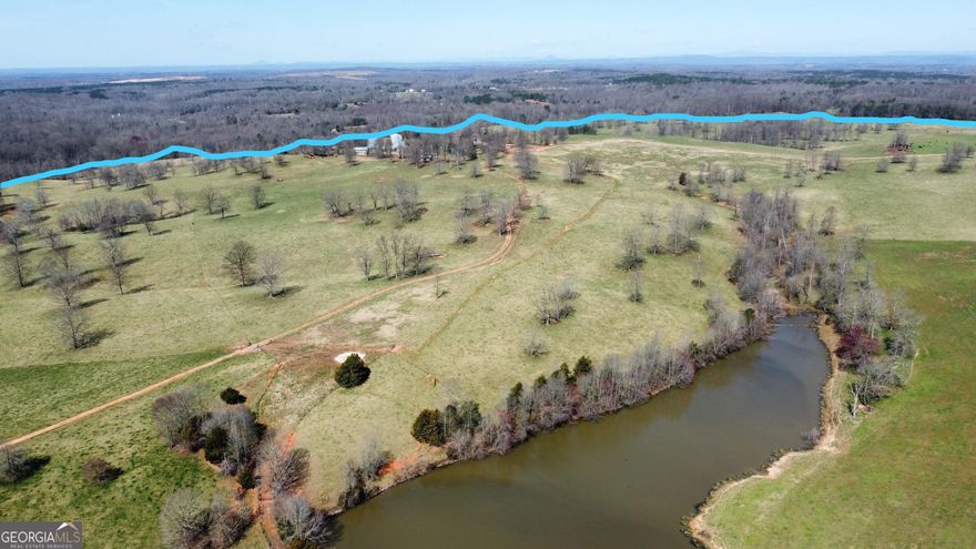 This is an extremely rare find where open pastures are beyond 600 acres, great access to I-85 inside an hour from Atlanta. Whether it is your new family cattle ranch, the next equine center for Georgia with literally dozens of pastured horse farms, or maybe some other plan you have always envisioned if you could ever find the right location. Can you  imagine your home on the hill where you can see a square mile of your own pastures? Serious buyers - please. There is a seed company on-site that will lease back 4 acres for two additional seasons before shutting down - but will have limited affect on anyone's plans or operations. Please do not attempt to enter the property without the Listing Agent. Any access is at your own risk.