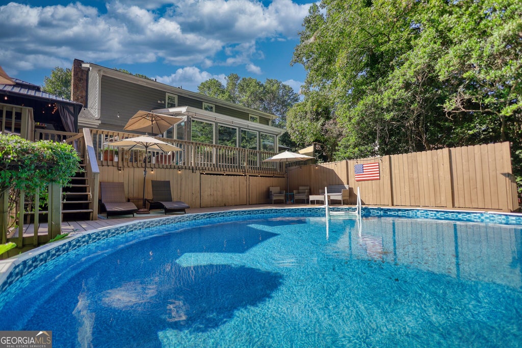 Photo of 3655 Sugar Creek Lane SE, Conyers, GA 30094 (MLS # 10845358)