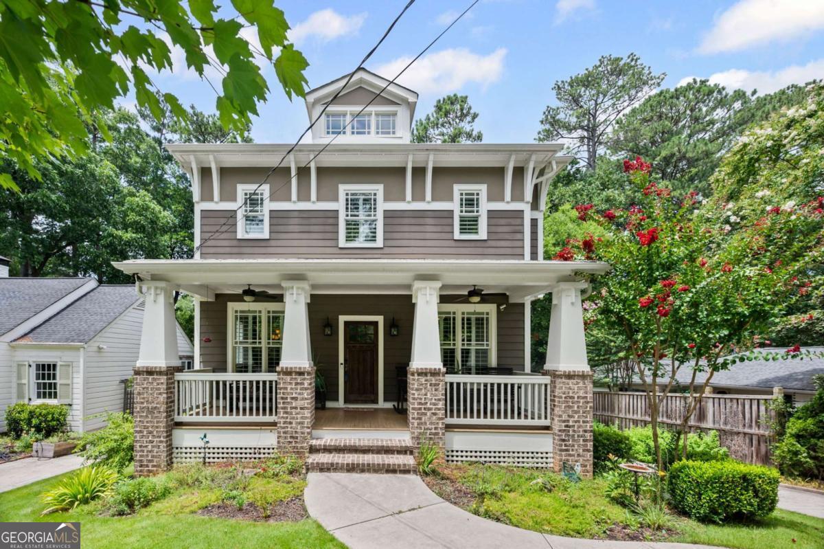 Welcome to your dream home, where Southern charm and modern elegance seamlessly blend to create the perfect sanctuary. As you approach the charming rocking chair front porch, imagine sipping your morning coffee and greeting the day. Step inside to discover stunning hardwood floors that lead you to a spacious room nestled at the front of the home, ideal for remote work or study. The family room, featuring built-in bookshelves, invites cozy evenings by the fire, while the eat-in kitchen boasts granite countertops, a breakfast bar with a view, and top-of-the-line stainless steel appliances, including 6-burner gas cooktop, double ovens and a hood vent. A butler's pantry elegantly connects the kitchen to a separate dining room, perfect for entertaining. On the main floor, a full bath and bedroom offer convenience and versatility for guests or multi-generational living. Venture outside through French doors to a screened-in back porch, where you can enjoy cool fall evenings or step onto the grilling deck for outdoor gatherings. The expansive, fenced-in backyard is ideal for pets and play alike. Upstairs, the oversized primary suite is your private haven, complete with a covered balcony-a serene escape for reading or relaxing. The luxurious en-suite bath features a soaking tub, double vanities, and a waterfall showerhead, alongside an extra-large walk-in closet. Two spacious secondary bedrooms provide ample room for family or guests. Additionally, the fully finished basement with a full bath offers endless possibilities for recreation or additional living space. This home is more than just a place to live-it's a lifestyle waiting to be embraced.