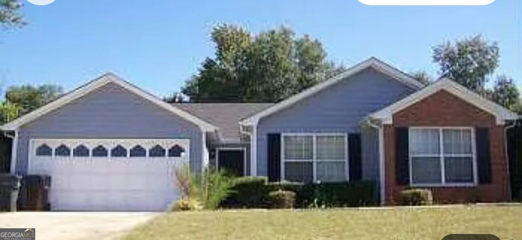 Photo of 1119 Whisper Wind Drive, McDonough, GA 30253 (MLS # 10849436)