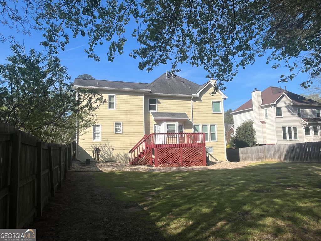 Photo of 930 Cedar Bluff Trail SW, Lilburn, GA 30047 (MLS # 10715719)