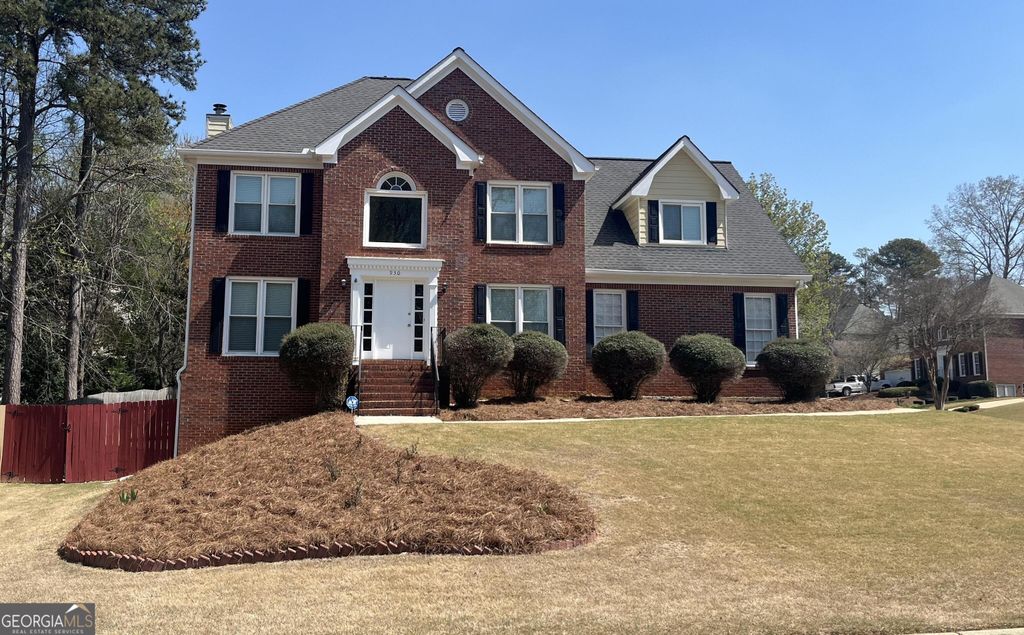 Photo of 930 Cedar Bluff Trail SW, Lilburn, GA 30047 (MLS # 10715719)