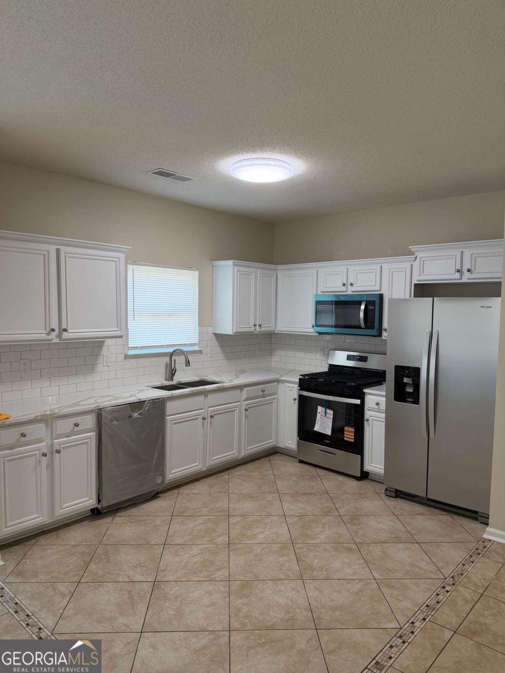 Photo of 1560 Danube Court, Atlanta, GA 30349 (MLS # 10730019)