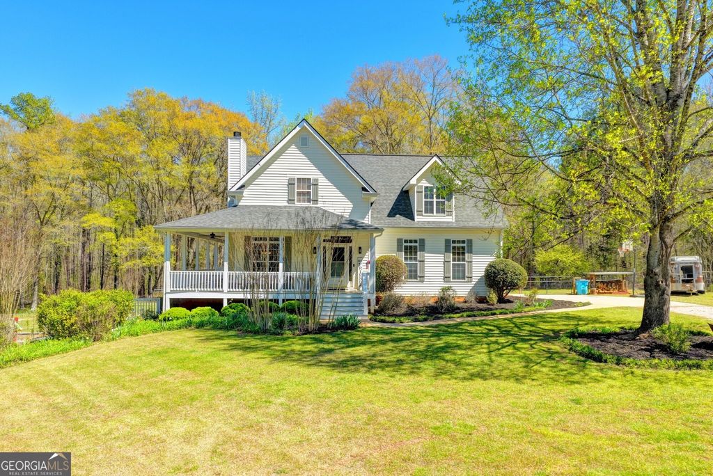 Photo of 1555 Lower River Road, Covington, GA 30016 (MLS # 10735689)