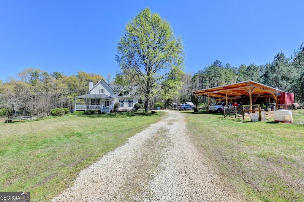 Photo of 1555 Lower River Road, Covington, GA 30016 (MLS # 10735689)