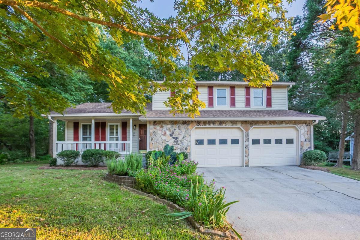 Located just minutes from I-675, this 3-bedroom, 2-bathroom multi-split home offers a spacious and functional layout. The main level features a formal living room and formal dining room, along with an updated kitchen showcasing white shaker-style cabinets and granite countertops. The lower level includes a cozy living area with a stone-faced fireplace, perfect for relaxing or entertaining. All bedrooms are located on the upper level, with the primary suite featuring a tiled shower. The secondary bedrooms and bathroom are generously sized. Upgrades include new carpet and LVP flooring throughout the home, new light fixtures, a full exterior repaint, repainted cabinets and a refresh of both bathrooms. Additional features include a laundry area in the garage, a backyard pergola, and a storage shed for extra convenience. Discounted rate options and no lender fee future refinancing may be available for qualified buyers of this home.