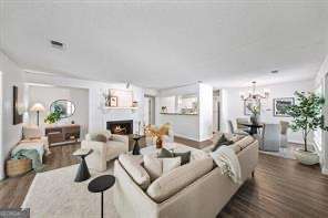 RARE 3.125% ASSUMABLE LOAN! Opportunities like this never hit the market. With today's rates, this feature alone makes this 2-bedroom, 2-bath home the most affordable and desirable option in Marietta. Inside, you'll find 1,452 sq. ft. of single-level living, with equitable bedrooms, a huge sunroom drenched in natural light, and fresh updates including new paint, new water heater, and stylish LVP flooring. The layout feels spacious and flexible, perfect for entertaining, relaxing, or working from home. (House hack and add a room mate. You've got the space!) Step outside and discover the community's hidden-gem setting: tree-lined streets, a sparkling pool, a serene pond, and plenty of quiet green space that make it feel worlds away while still being minutes from everything. Location couldn't be better. HELLO! You're less than 2 miles from historic Marietta Square, with its restaurants, shops, and events, and within walking distance to Laurel Park with tennis, basketball, and trails for your outdoor fix. With a low HOA fee and this ONCE IN A GENERATION financing advantage, 865 Cavalry is more than a home. It's an incredible value in one of Marietta's most sought-after spots. Welcome home, you deserve to finally relax.