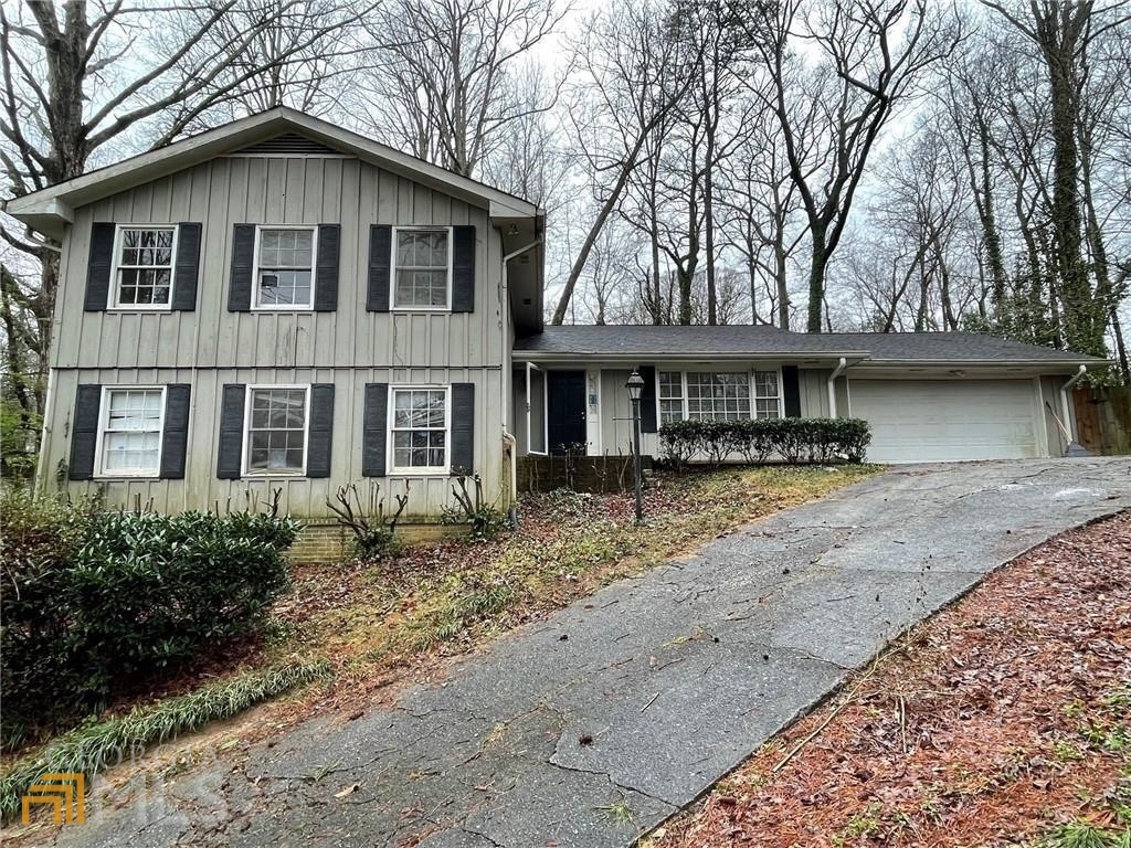 Exceptional investment opportunity for renovation to list for sale or for rent. Great East Cobb location and schools. Sold "As Is" with no disclosure. Owner does not live in home. Home does not qualify for VA or FHA financing. Is cleaned out and ready for remodel and renovation. This is an investment property in the highly desired Pioneer Woods/Weatherstone subdivisions. No required HOA unless chosen. Pioneer Woods residents are allowed to join Weatherstone Swim & Tennis if desired. Great location close to Truist Park, The Battery, Marietta Square, and lots of green space and parks. The property is also convenient to I-75, I-85, and I-285. Home has 2 Master En suites plus 2 additional guest rooms and 3 full and 1 half bathrooms. The 800 SqFt Bonus room with lots of natural light has many uses. Large in-law or teen suite in lower level.
