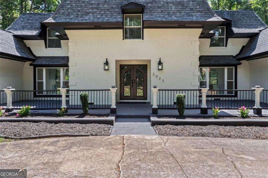 Photo of 2023 Stoneleigh Drive, Stone Mountain, GA 30087 (MLS # 10761110)
