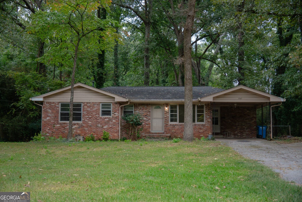 Photo of 5565 Bowers Road, Stone Mountain, GA 30087 (MLS # 10866849)