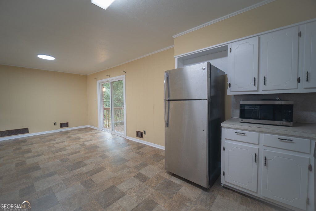 Photo of 5565 Bowers Road, Stone Mountain, GA 30087 (MLS # 10866849)