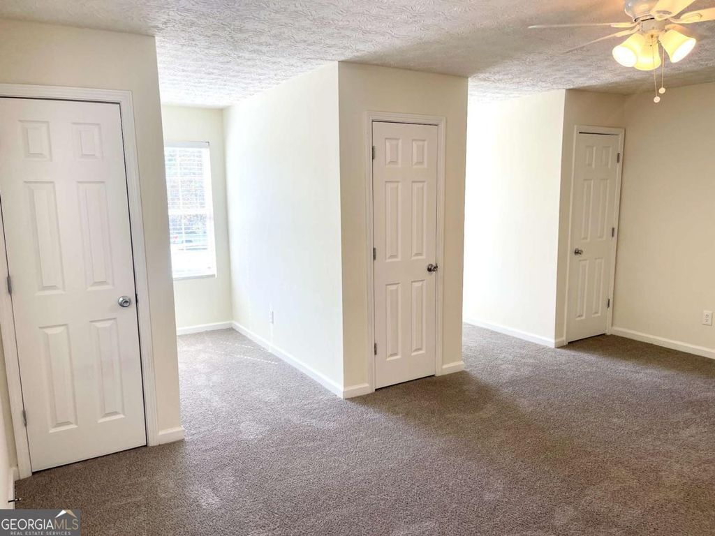 Photo of 6255 Topaz Trail, Atlanta, GA 30349 (MLS # 10688859)