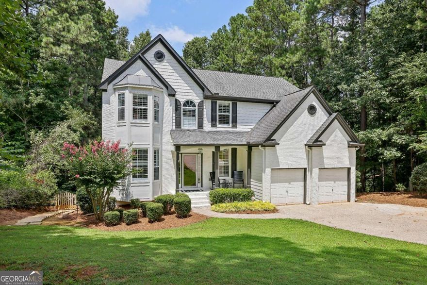 Beautifully updated home on 1 plus acre lot in sought after Sable Pointe. Enjoy rare opportunity for Milton/Milton schools with finished basement and great neighborhood amenities for under 1M! The main level features entry foyer, living room, dining room, powder room, open kitchen, great room, 9' ceilings, wood floors, plantation shutters, crown molding, gas fire place, and walk out to back deck with views of large fenced backyard. The kitchen renovation includes granite counters, stainless steel appliances, gas range, tile backsplash, farm sink, stained cabinetry, wine refrigerator, microwave, vent hood, large pantry, and peninsula with bar seating. Upstairs you find large primary bedroom with separate sitting room/secondary den, primary bathroom with glass enclosed tile shower, soaking tub, granite double vanity, large walk in closet with built in shelving, laundry room, linen closet, 3 large guest bedrooms, renovated guest bathroom, and upgraded wood floors. The finished daylight basement includes added cabinetry/counter space, additional guest bedroom, full bathroom, large den/recreation room, gym space, additional unfinished storage areas, upgraded wood floors, and walk out access to covered/dry-deck lower level deck and backyard. Additional highlights are cul-de-sac street, large/wide driveway, brick/hardie board construction, thermal pane windows, extra deep garage space, landscaped/private front and backyard, outbuilding for storage, and large neighborhood pool with ample decking/seating area within a couple minute walk from the home. Enjoy easy access to Milton, Dowtown Alpharetta, top schools, shopping, parks, GA400, and more.