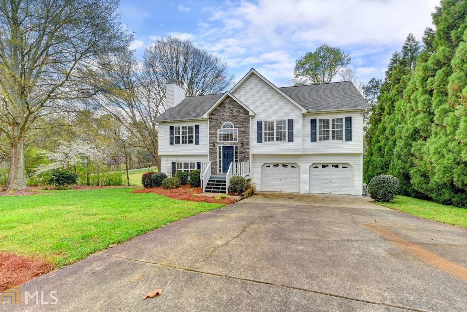 Welcome Home! Charming home nestled in quiet neighborhood with 4 bedrooms and 3 bathrooms. Island kitchen has sunny breakfast nook and view to fireside family room. Separate dining room perfect for entertaining. Main floor master. Finished lower level w/ bedroom and bath. Generous deck perfect for enjoying wooded privacy.